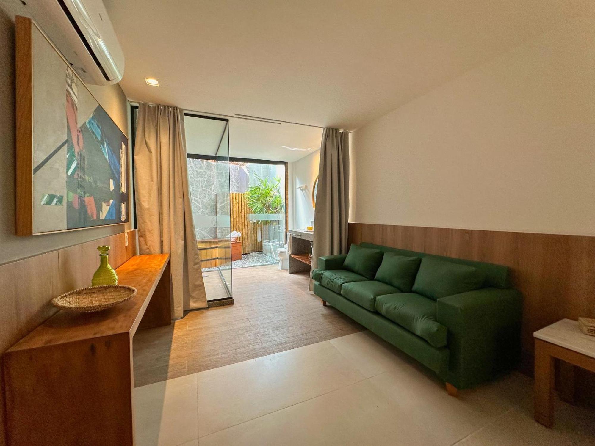 Passagem Concept Hotel E Spa Cabo Frio Exterior foto A living room in a micro apartment in Beijing, China
